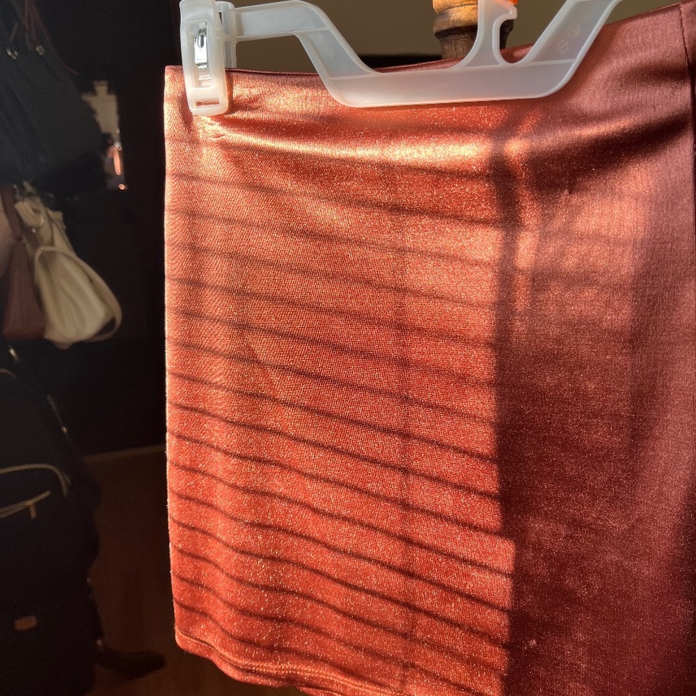 Shiny silk mini skirt